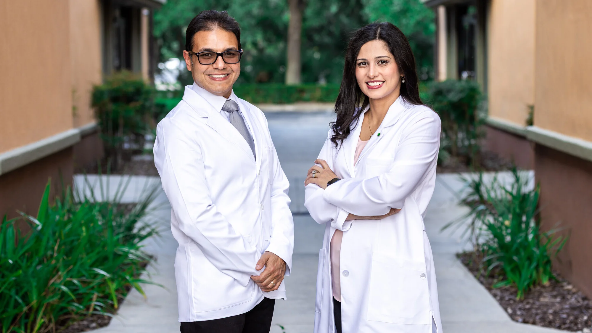 Dr. Mariana Al Nasser and Dr. Peter Azer outside New Dawn Dental